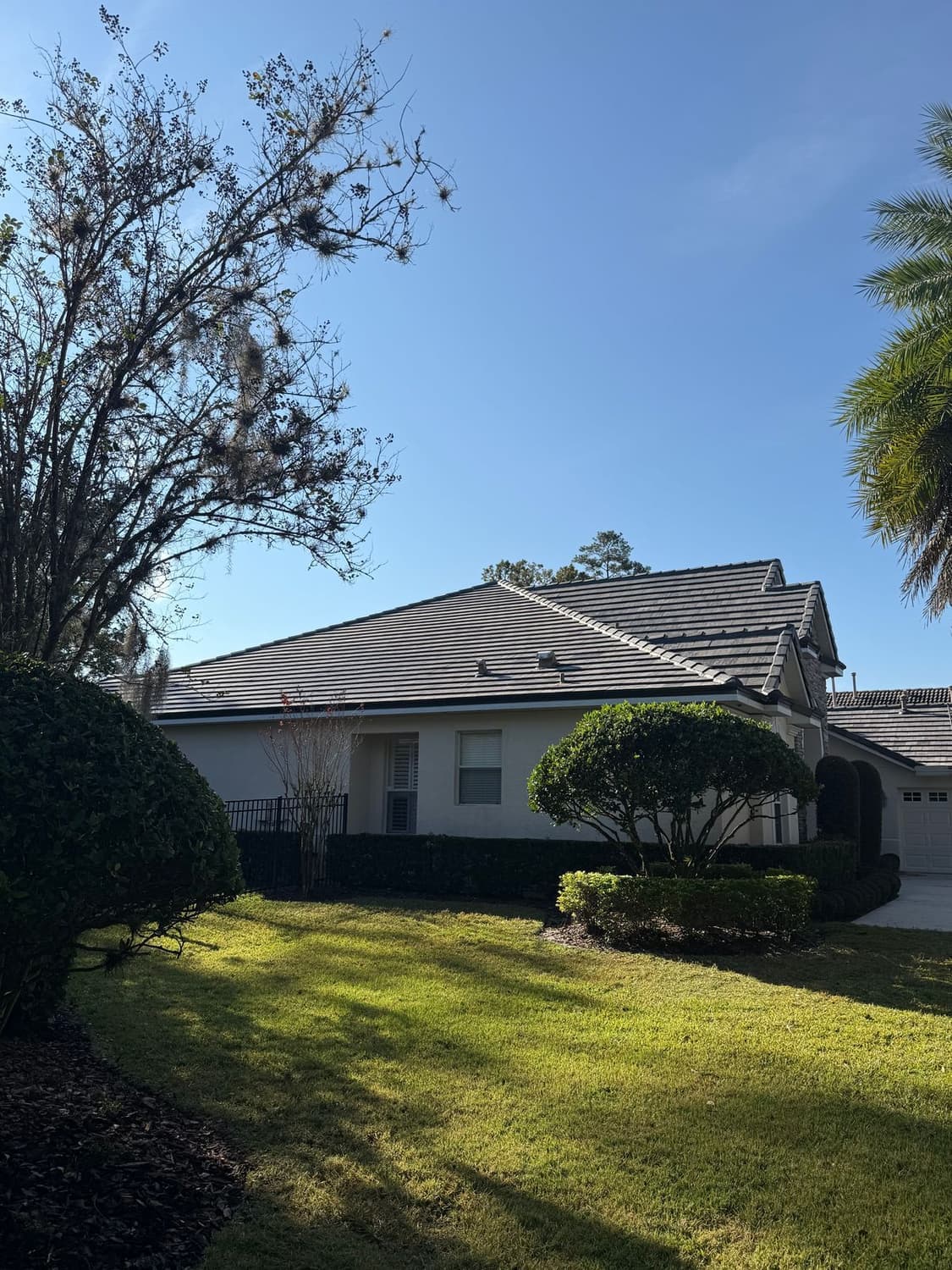 Alaqua Lakes concrete tile roof in Eagle Bel Air Concord Blend by Southern Traditions Roofing