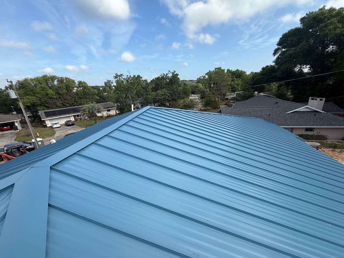Clermont 24-gauge Kynar PVDF painted standing seam metal roof by Southern Traditions Roofing