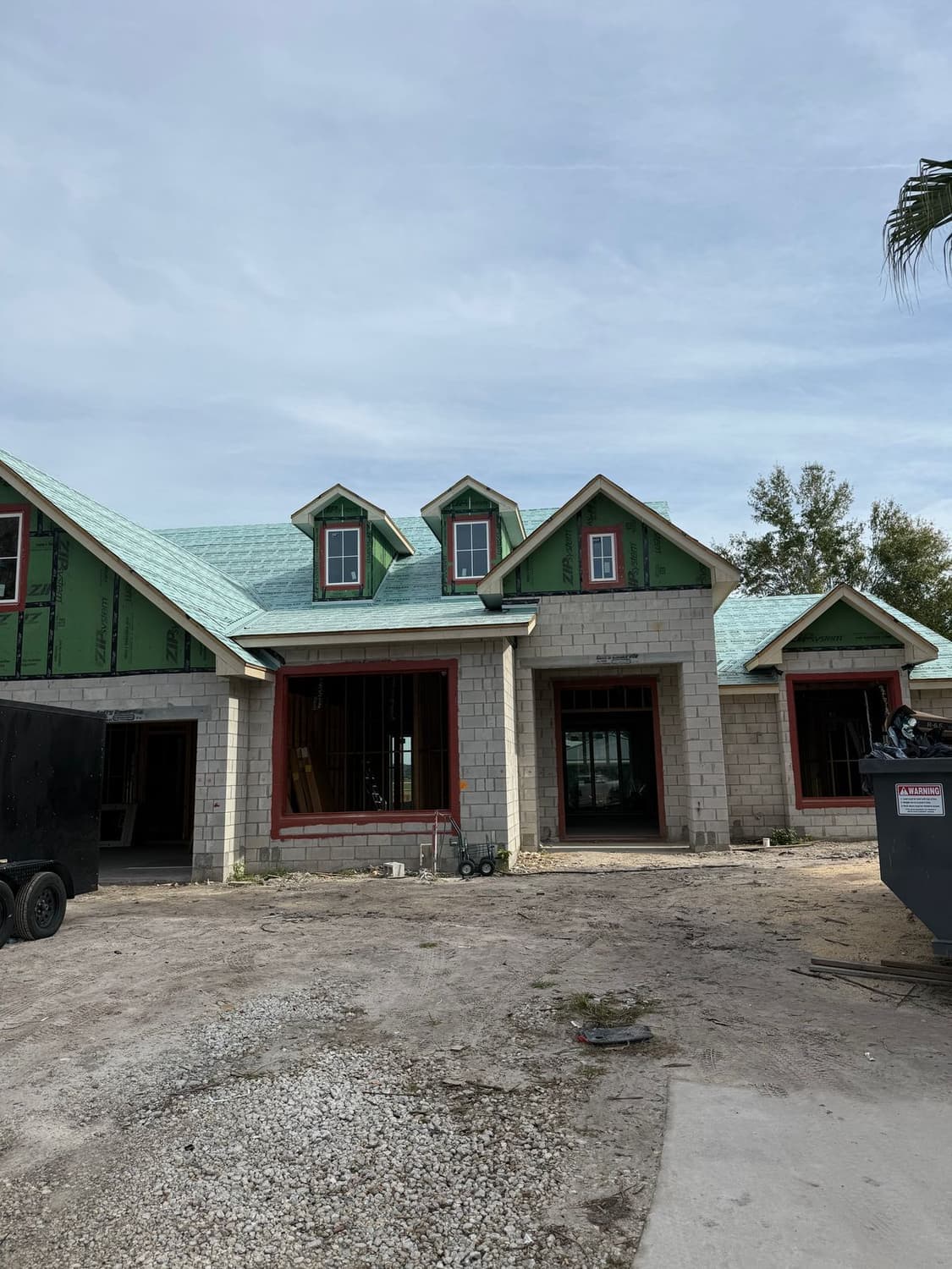 Windermere 24-gauge Kynar PVDF matte black standing seam metal roof by Southern Traditions Roofing